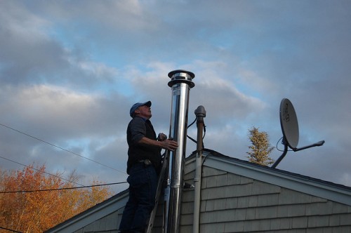 Installing our woodstove chimney!