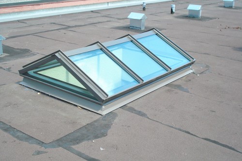 Double pitched with gable skylights