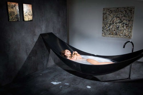 Hammock style floating bathtub