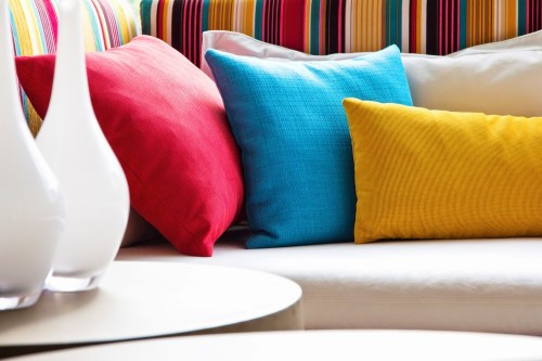 Add bright pillow colors to your rooms